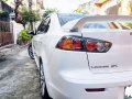 Selling Pearl White Mitsubishi Lancer 2010 in Quezon City-4