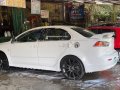 Selling Pearl White Mitsubishi Lancer 2010 in Muntinlupa-1