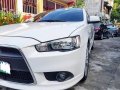 Selling Pearl White Mitsubishi Lancer 2010 in Quezon City-5