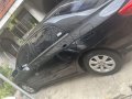 Selling Black Toyota Corolla Altis 2011 in Kalayaan-2