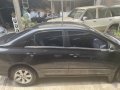 Selling Black Toyota Corolla Altis 2011 in Kalayaan-4