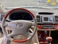 Selling Brightsilver Toyota Camry 2002 in Makati-4