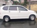 Selling White Toyota Avanza 2010 in Quezon-1