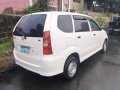 Selling White Toyota Avanza 2010 in Quezon-0