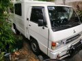 Selling White Mitsubishi L300 2014 in Cainta-5