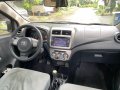 Selling Black Toyota Wigo 2015 in Quezon-0