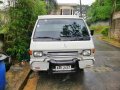 Selling White Mitsubishi L300 2014 in Cainta-9