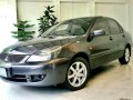 Selling Greyblack Mitsubishi Lancer 2011 in Quezon City-7