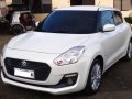 Pearl White Suzuki Swift 2019 for sale in Manual-0