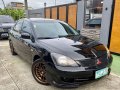 Selling Black Mitsubishi Lancer 2011 in Manila-8