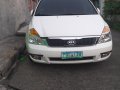 Selling White Kia Carnival 2011 in San Pedro-0