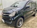 Selling Black Toyota Avanza 2014 in Taal-7