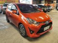 Orange Toyota Wigo 2018 for sale in Quezon City-7