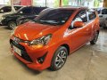 Orange Toyota Wigo 2018 for sale in Quezon City-9
