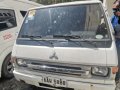 HOT!! Selling White 2014 Mitsubishi L300 by verified seller-1