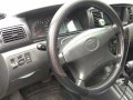 Brightsilver Toyota Corolla Altis 2005 for sale in Quezon-0
