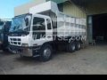 Isuzu dump truck 10w-0