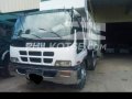 Isuzu dump truck 10w-1