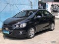 Black Chevrolet Sonic 2013 for sale in Samal-9