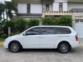 Pearl White Kia Carnival 2014 for sale in Automatic-7