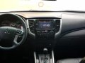 Pearl White Mitsubishi Strada 2018 for sale in Automatic-0