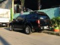 Selling Black Mitsubishi Strada 2010 in Quezon-8