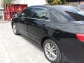 Black Toyota Corolla Altis 2010 for sale in Manual-7