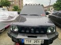 Sell Grey 2011 Suzuki Jimny in Masantol-0