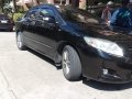 Black Toyota Corolla Altis 2010 for sale in Manual-1