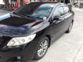 Black Toyota Corolla Altis 2010 for sale in Manual-8