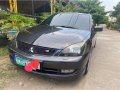 Selling Black Mitsubishi Lancer 2010 in Imus-0