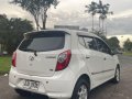 Pearl White Toyota Wigo 2014 for sale in Quezon City-3