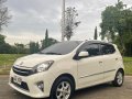 Pearl White Toyota Wigo 2014 for sale in Quezon City-7