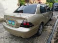 Selling Golden Mitsubishi Lancer 2010 in Imus-5