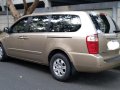 Beige Kia Carnival 2009 for sale in Subic-2