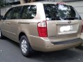 Beige Kia Carnival 2009 for sale in Subic-4