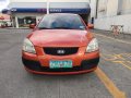 Orange Kia Rio 2007 for sale in Automatic-9