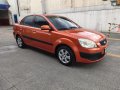 Orange Kia Rio 2007 for sale in Automatic-7