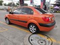 Orange Kia Rio 2007 for sale in Automatic-4