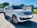 Pearl White Toyota Fortuner 2013 for sale in Malvar-5