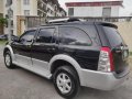 Selling Black Isuzu Alterra 2009 in Cainta-5