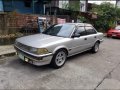 Selling Pearl White Toyota Corolla 1990 in Quezon-8