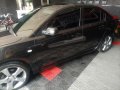 Selling Black Mazda 3 2005 in Bulakan-3