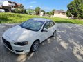 White Mitsubishi Lancer 2010 for sale in Muntinlupa -1