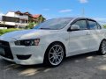 White Mitsubishi Lancer 2010 for sale in Muntinlupa -2