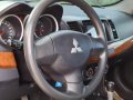 White Mitsubishi Lancer 2010 for sale in Muntinlupa -8