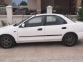 Selling White Mazda 323 1997 in Noveleta-8