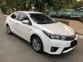 Pearl White Toyota Corolla Altis 2014 for sale in Pasay -7