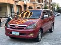 Selling Red Toyota Innova 2005 in Quezon City-0