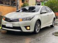 Sell Pearl White 2014 Toyota Corolla Altis -4